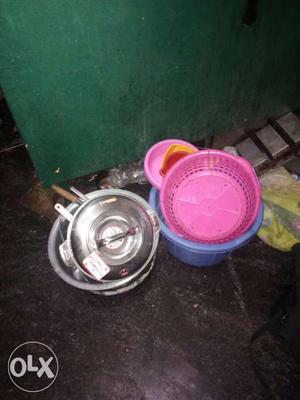 Pink And Blue Plastic Container; Stainless Steel Container