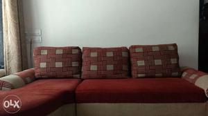 Red And White Couch With Throw Pillows
