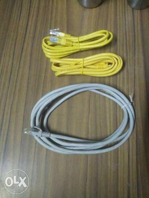 Three Gray And Yellow Cables