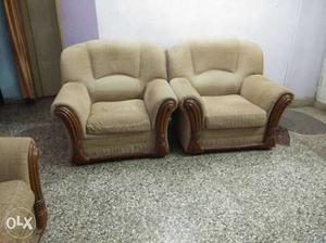 Two Brown-and-beige Wooden Frame Sofa Chairs