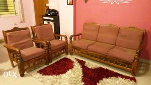 Wooden Sofa (3+2) with 2 Covers in excellent condition.