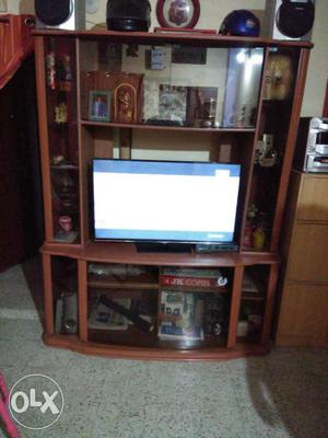 ;brown Wooden Entertainment Center for tv