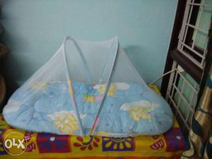 Baby's Blue And Yellow Portable Bed