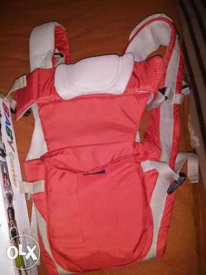 Baby's Red And White Carrier