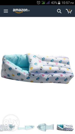 Baby's White And Teal Sleeping Nest
