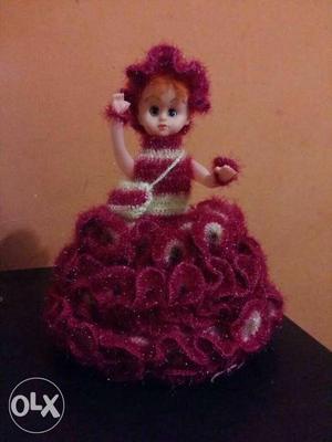 Girl In Maroon And White Knitted Dress Doll