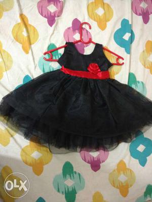 New frock,one and half years old,black and red