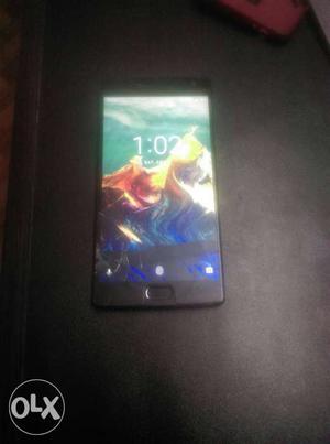 One pluse 2 In superb condition with full box,n,charger 1yr