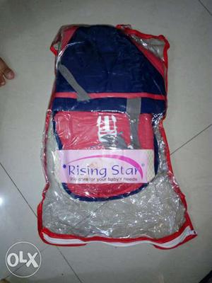 Rising star baby carry belt. Unused and with