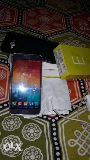 Samsung E7.. With Headphone, billbox, charger,