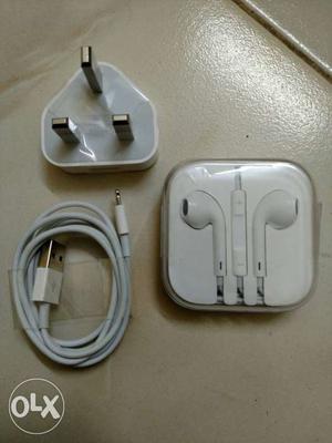Unused Apple earpods, lighting cable & power adaptor.