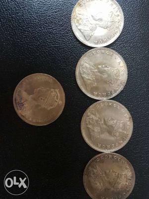 100 and 136 years old coins.