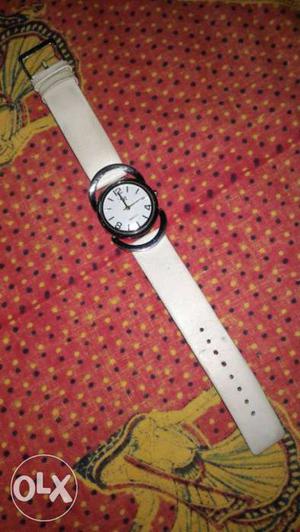 A new women watch.. with a nice white belt.