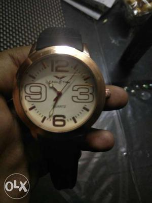 Brand new golden colour wrist watch with black