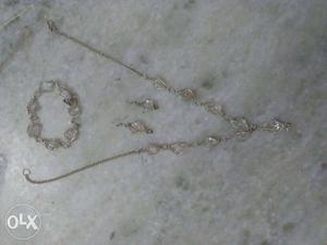 Silver Necklace; Pair Of Earrings And Bracelet