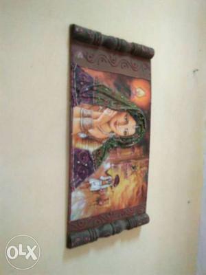 Woman In Green Dupatta On Brown Wooden Frame