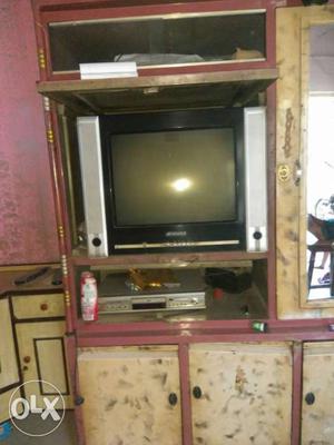 Beige Wooden TV Hutch With Black CRT TV