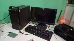Black Flat Screen Computer Monitor. Computer Tower, Corded