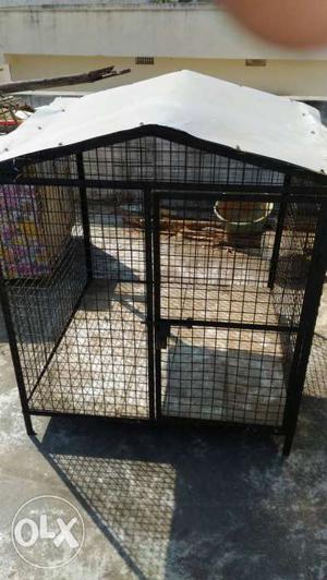 One strong iron dog cage and two strong wood pet