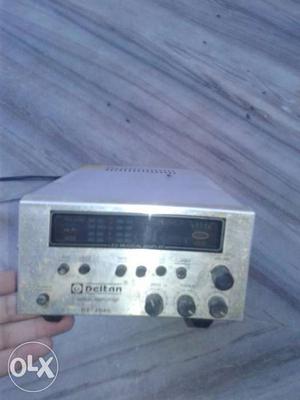 Silver-colored Deltan Amplifier