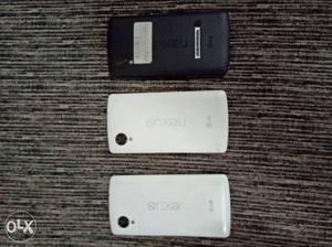 Three White And Black Nexus Smartphones