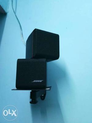 Two Black Bose Audio Speakers