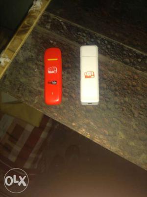 Two Red And White Mobile Broadbands