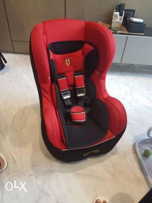 Baby's Red And Black Booster Seat