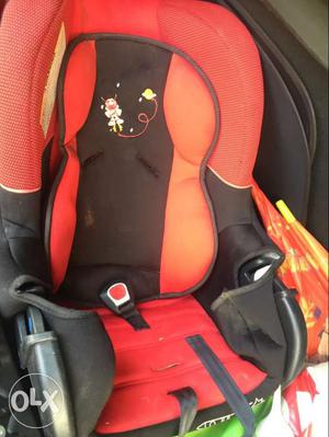 Baby's Red And Black Car Seat Carrier