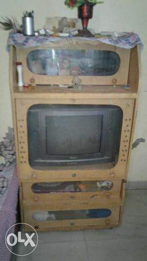 Black CRT TV; Brown Wooden TV Hutch