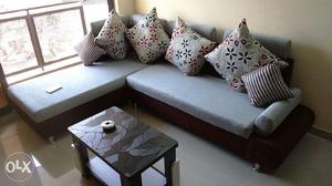 Blue And white Couch With Throw Pillows