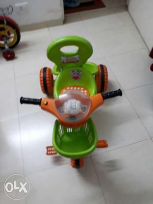 Green And Orange Ride On Trike