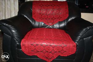 Synthetic leather sofa and wrought iron cot with