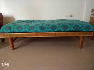 The Brown sag Wooden Bed