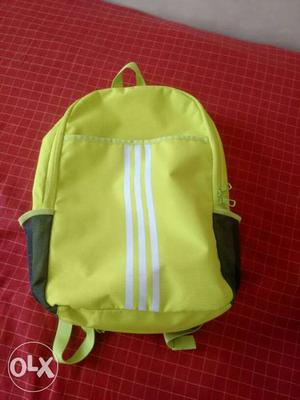 This is a neon green fully water proof adidas
