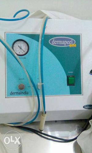 White And Blue Dermapeel Machine