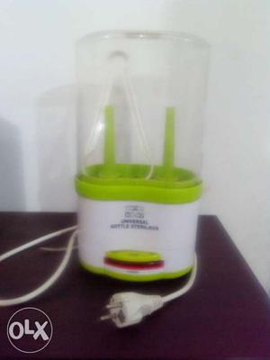 White And Green Feeding Bottle Sterilizer