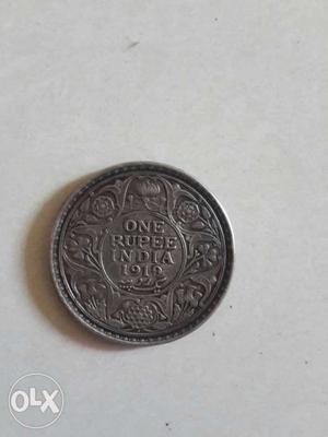 Its a king george 5 indian old coin. ().