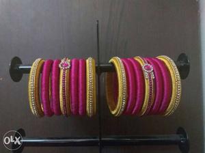 Pair Of Pink-and-gold Silk Thread Bangles