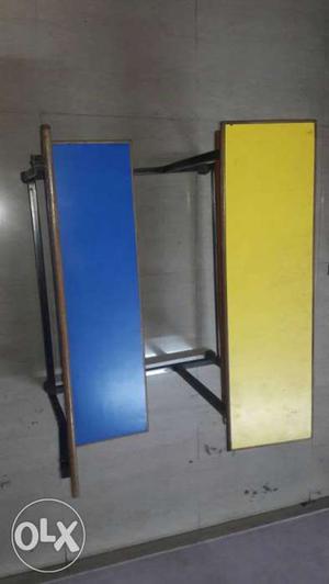 Two Blue And Yellow Wooden Board