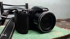 Its nikon 14.1mp And 21x Zoom Bridge Camera