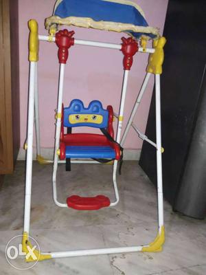 Baby's White, Red And Yellow Indoor Swing