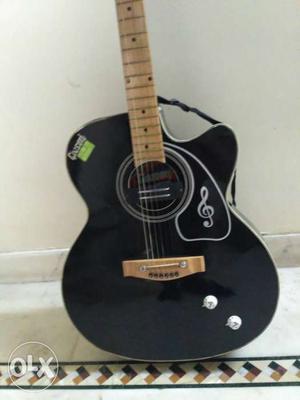 Black And Brown Cutaway Acoustic Guitar
