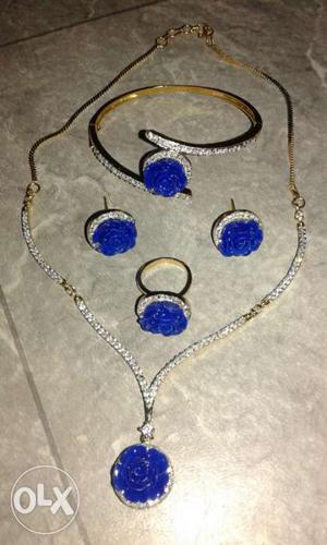 Gold,silver, And Blue Necklace, Earrings, And Ring
