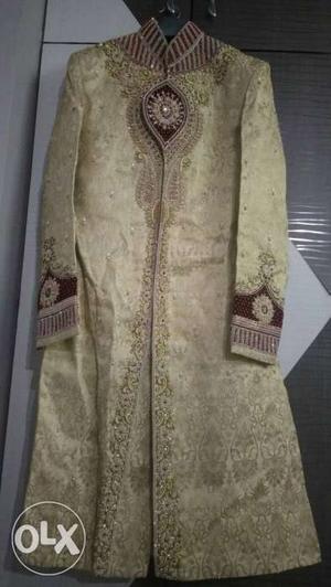 Golden colour 1 time used sherwani with safa and