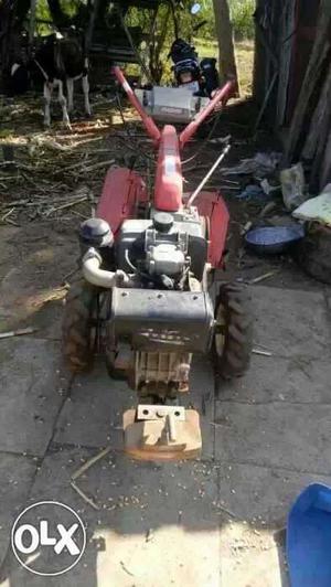 Gray And Red Lawn Mower
