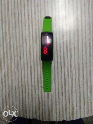 Green and black led watch