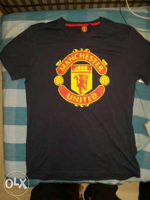 Manchester United official tshirt. size small but