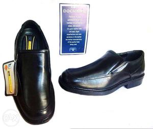 Pair Of Black Leather Loafers
