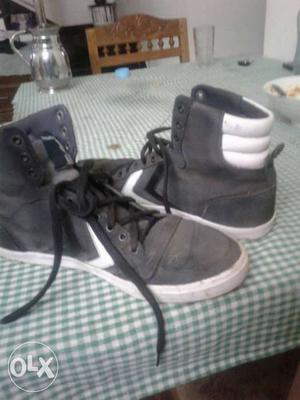 Pair Of Black-and-white High Top Sneakers
